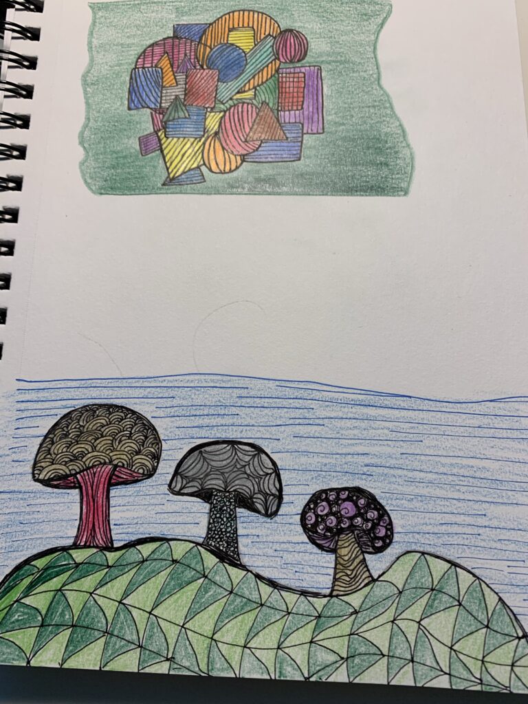 Two drawings in a sketchbook, one of overlapping geometric shapes one of three mushrooms on a hill.