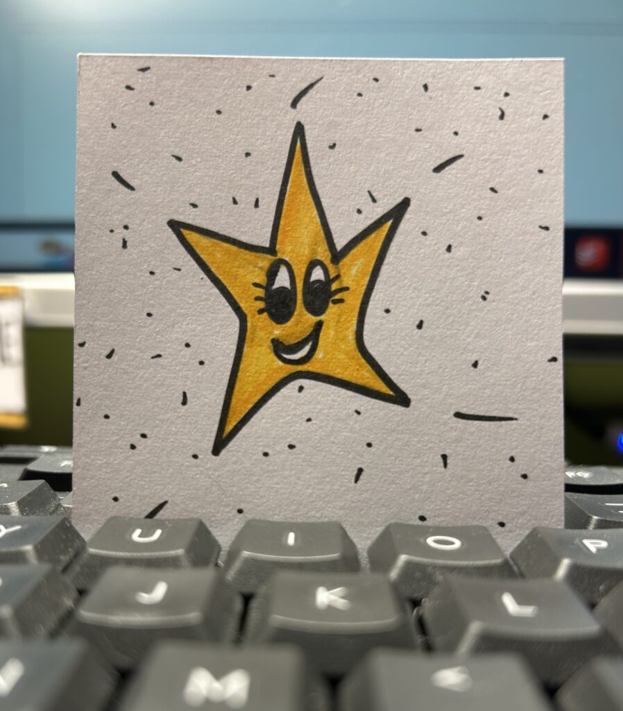 A drawing of a cartoonish gold star.